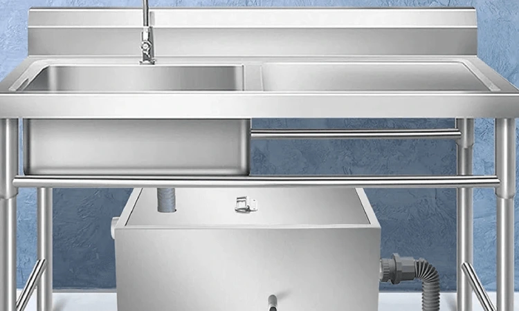 Pemasangan grease trap stailess, Sumber: a-teamplumbing.com